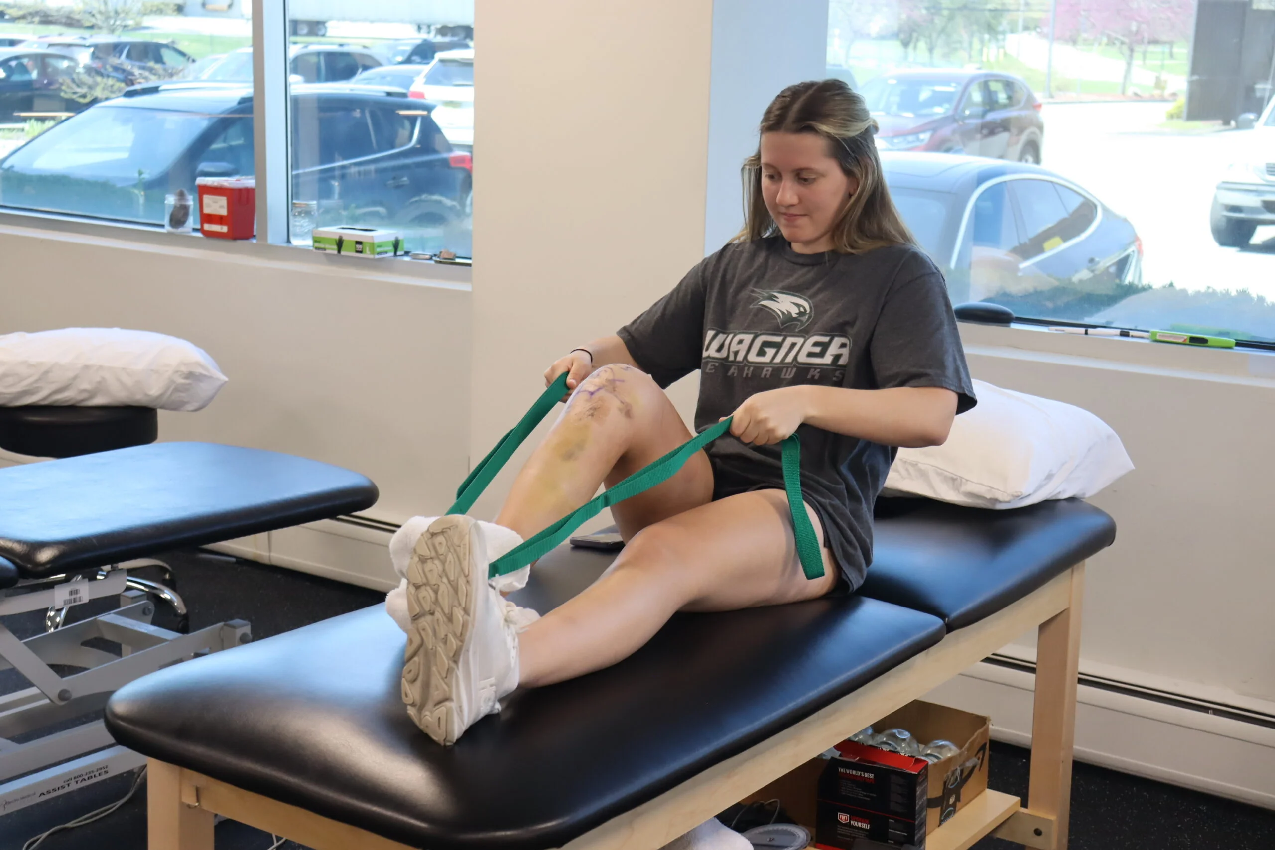 Working on range of motion for her knee