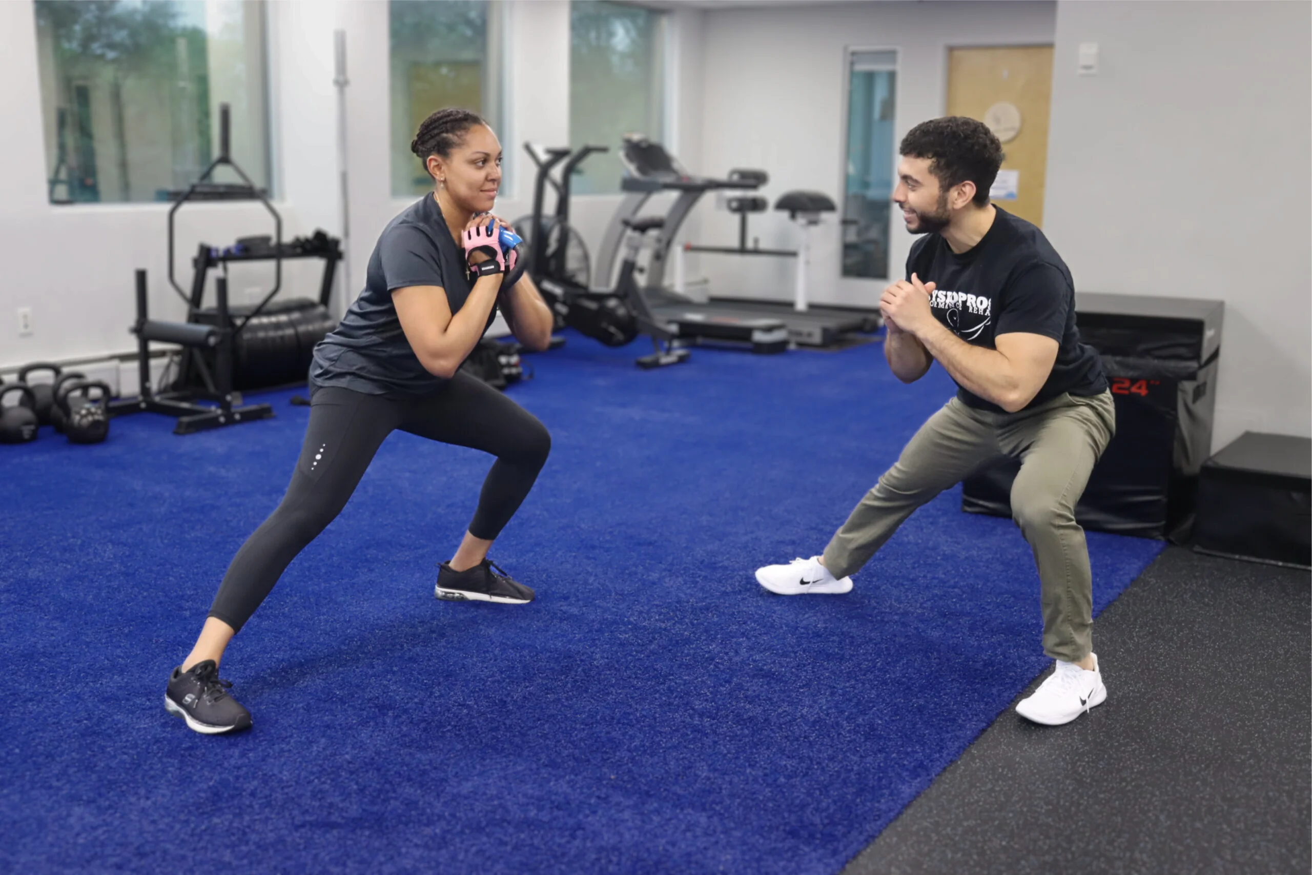 Physical Therapist Demonstrating Side Lunges